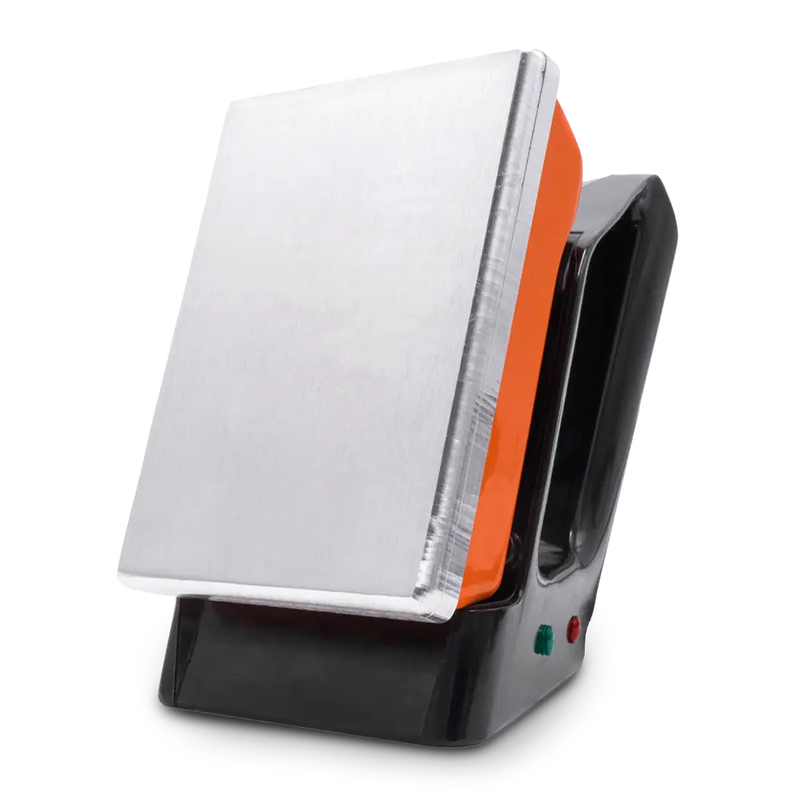 Chargez l&#39;image dans le visualiseur de galerie, Orangenes Wachsbügeleisen mit schwarzem Griff.
